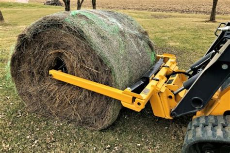 round bale unroller for skid steer|round bale attachments for tractors.